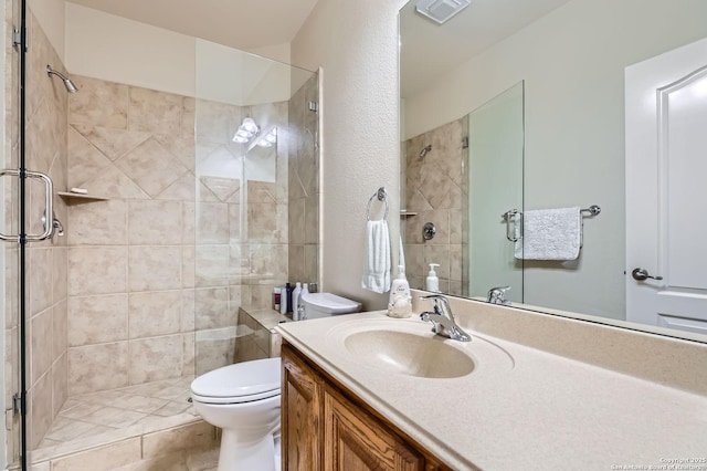 12424 Andice, Helotes, TX 78023 - full bathroom with toilet, a stall shower, and vanity