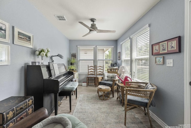 3402 Red Fls, San Antonio, TX 78253 - sitting room with wood finished floors, ceiling fan, and baseboards