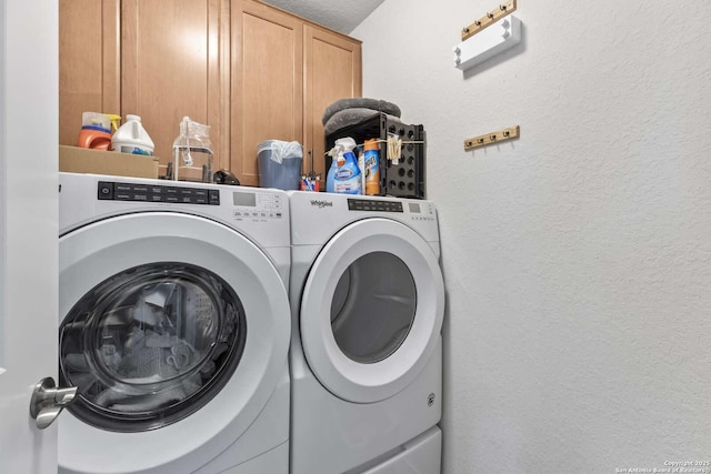 3402 Red Fls, San Antonio, TX 78253 - laundry room with cabinet space, washing machine and dryer, and a textured wall