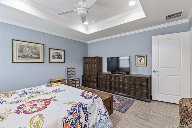 3402 Red Fls, San Antonio, TX 78253 - bedroom featuring a tray ceiling, ornamental molding, wood finished floors, and ceiling fan