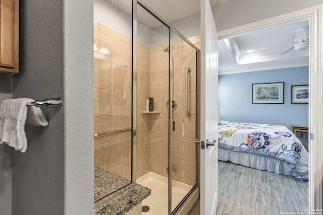 3402 Red Fls, San Antonio, TX 78253 - bathroom with ensuite bath, a shower stall, a tray ceiling, and crown molding