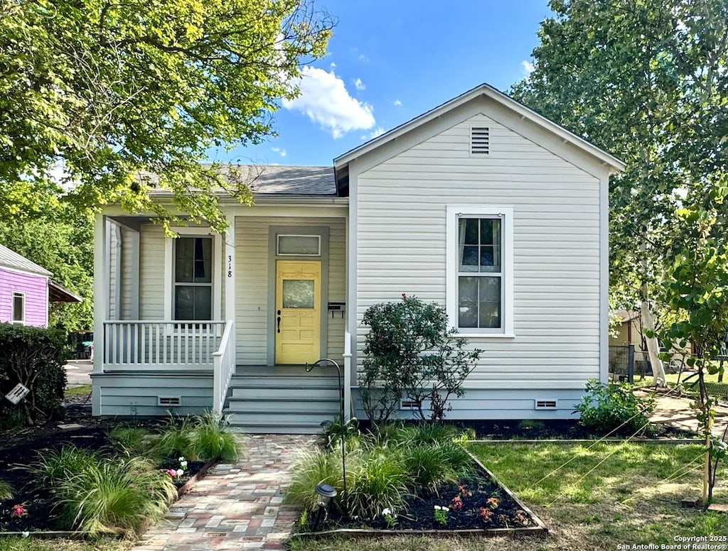 318 Leigh, San Antonio, TX 78210 - view of front of house with covered porch and crawl space