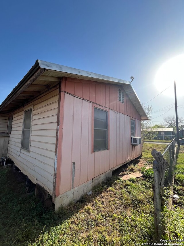 519 S Apple, Pearsall, TX 78061 - view of side of property featuring cooling unit