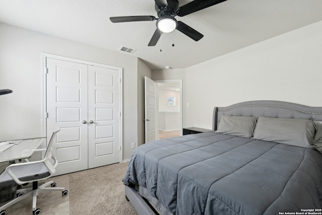 9210 Yaya Rd, Converse, TX 78109 - bedroom with a closet, light carpet, and ceiling fan