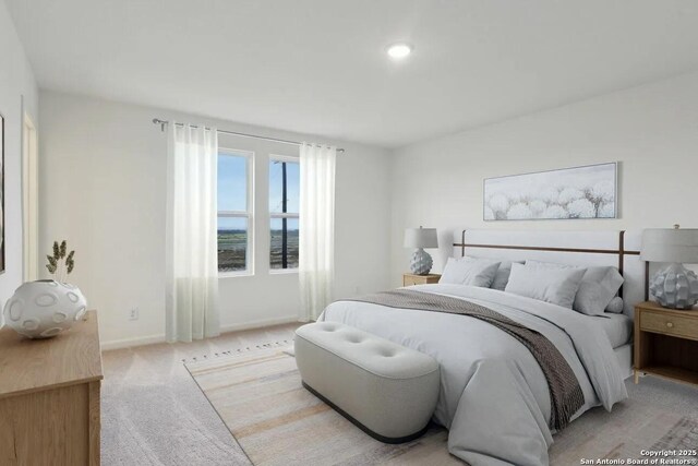5234 Thistle Pl, San Antonio, TX 78222 - bedroom with baseboards and light carpet