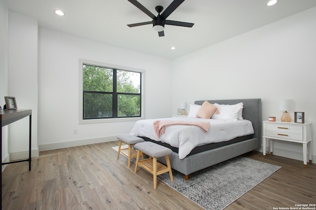 321 Porter St, San Antonio, TX 78210 - bedroom with wood finished floors, recessed lighting, baseboards, and ceiling fan