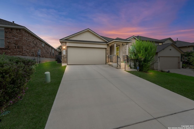 6022 Akin Pl, San Antonio, TX 78261 - single story home with a yard, driveway, an attached garage, and brick siding