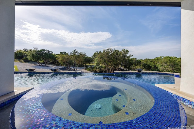 25003 Miranda Rdg, Boerne, TX 78006 - view of pool featuring a pool with connected hot tub