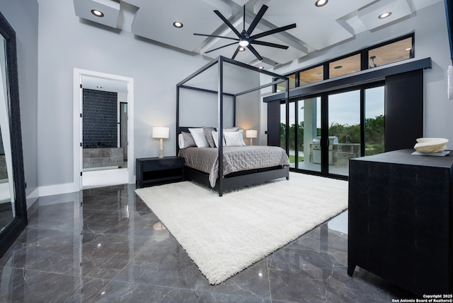 25003 Miranda Rdg, Boerne, TX 78006 - bedroom with dark marble finish floors, access to exterior, a towering ceiling, recessed lighting, and baseboards