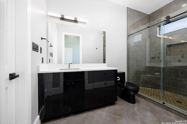 25003 Miranda Rdg, Boerne, TX 78006 - bathroom featuring vanity, a stall shower, toilet, and marble finish floors