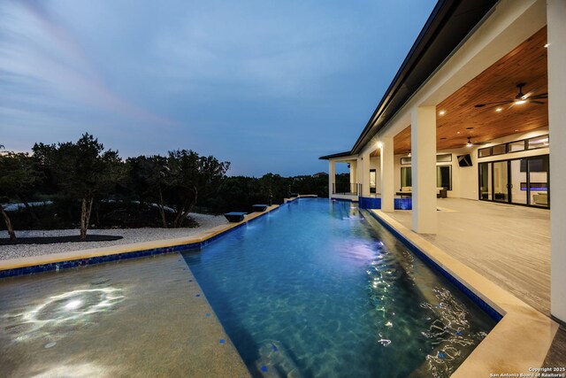 25003 Miranda Rdg, Boerne, TX 78006 - swimming pool with ceiling fan and a patio area