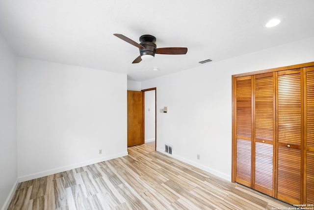 19739 Encino Way, San Antonio, TX 78259 - unfurnished bedroom with a closet, light wood finished floors, baseboards, recessed lighting, and ceiling fan