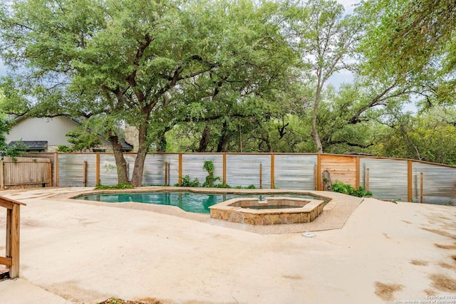 19739 Encino Way, San Antonio, TX 78259 - view of pool with a patio, a fenced backyard, and a pool with connected hot tub
