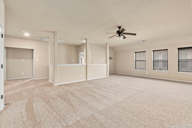 6031 Diego, San Antonio, TX 78253 - carpeted empty room with ceiling fan, a textured ceiling, and baseboards