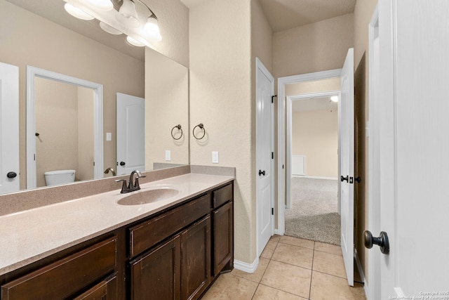 6031 Diego, San Antonio, TX 78253 - bathroom featuring vanity, toilet, and tile patterned floors