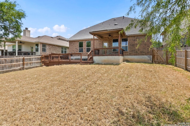 6031 Diego, San Antonio, TX 78253 - back of house with ceiling fan, brick siding, a deck, roof with shingles, and a gate