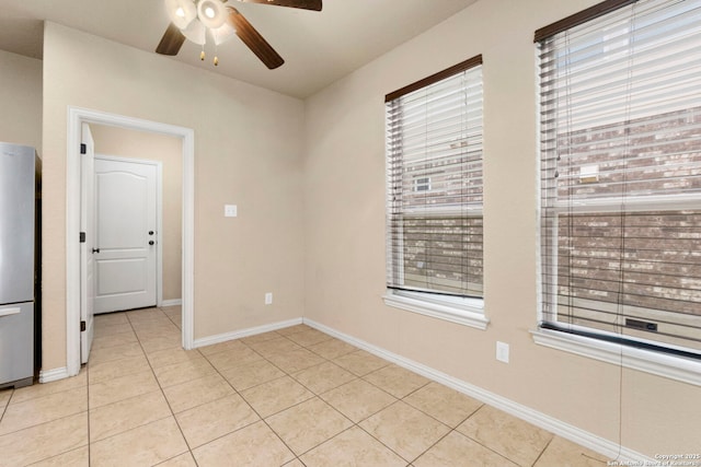 6031 Diego, San Antonio, TX 78253 - spare room featuring a ceiling fan, light tile patterned floors, and baseboards
