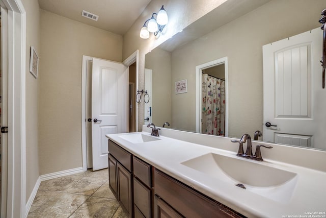 4522 Amos Pollard, San Antonio, TX 78253 - bathroom featuring double vanity and baseboards