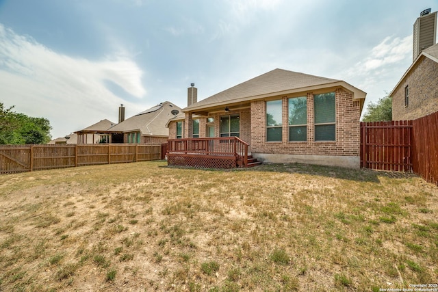 4522 Amos Pollard, San Antonio, TX 78253 - rear view of house featuring brick siding, a wooden deck, and a chimney