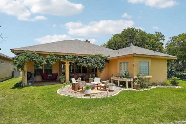 2756 Indian Wls, Kerrville, TX 78028 - back of house featuring a patio area, a lawn, central AC unit, stucco siding, and a shingled roof