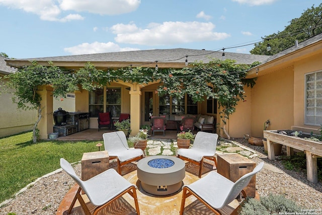2756 Indian Wls, Kerrville, TX 78028 - view of patio with an outdoor fire pit