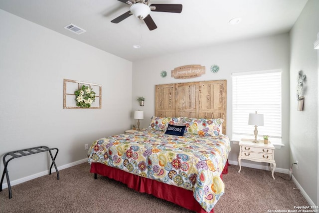 239 Damar Cv, Canyon Lake, TX 78133 - bedroom with carpet floors, baseboards, and ceiling fan