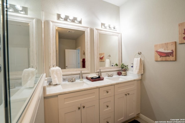 239 Damar Cv, Canyon Lake, TX 78133 - full bathroom featuring double vanity
