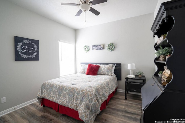239 Damar Cv, Canyon Lake, TX 78133 - bedroom featuring wood finished floors, baseboards, and ceiling fan