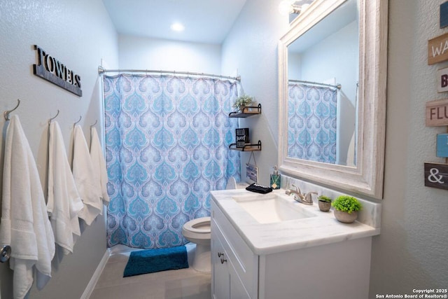 239 Damar Cv, Canyon Lake, TX 78133 - bathroom with vanity, toilet, and a shower with curtain