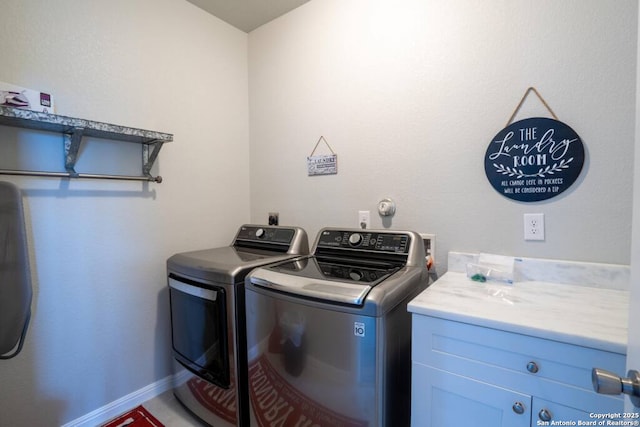 239 Damar Cv, Canyon Lake, TX 78133 - laundry area featuring washer and clothes dryer and cabinet space