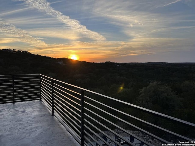 239 Damar Cv, Canyon Lake, TX 78133 - view of balcony at dusk