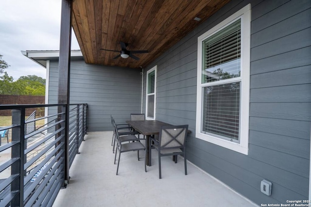 239 Damar Cv, Canyon Lake, TX 78133 - balcony with a ceiling fan and outdoor dining area