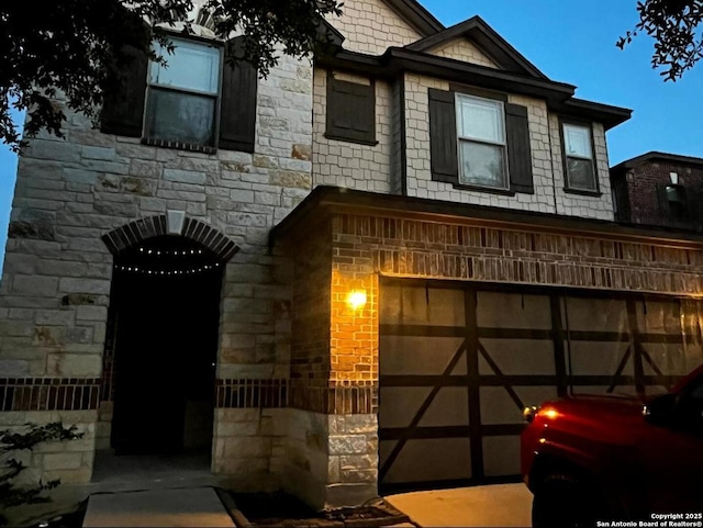 9819 Hawk Shr, Converse, TX 78109 - view of front of property with a garage and stone siding