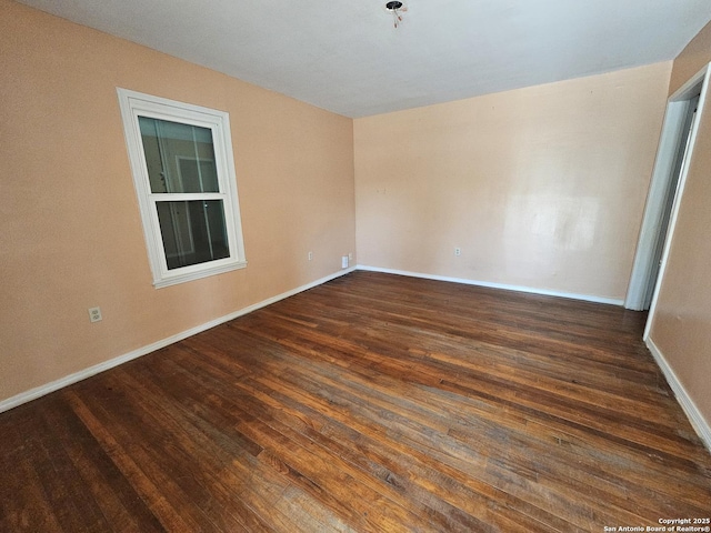 303 Cravens, San Antonio, TX 78223 - empty room featuring wood finished floors and baseboards