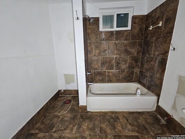 303 Cravens, San Antonio, TX 78223 - full bath featuring tub / shower combination and baseboards