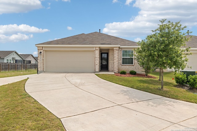 9003 La Garde Ml, San Antonio, TX 78254 - single story home featuring driveway, an attached garage, brick siding, and roof with shingles
