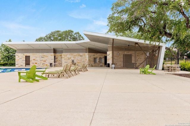 31908 Native Sun, Bulverde, TX 78163 - view of front of house with a patio area and a community pool