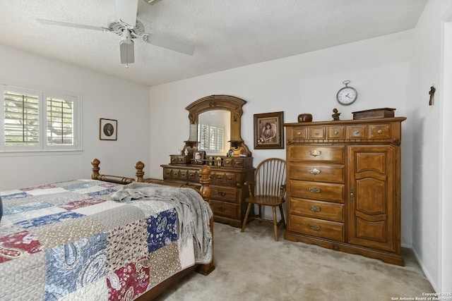 4722 Paradise Woods, San Antonio, TX 78249 - bedroom with light colored carpet, a textured ceiling, and a ceiling fan