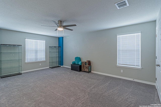 15166 Orpheus Way, San Antonio, TX 78245 - spare room featuring a ceiling fan, carpet floors, and plenty of natural light