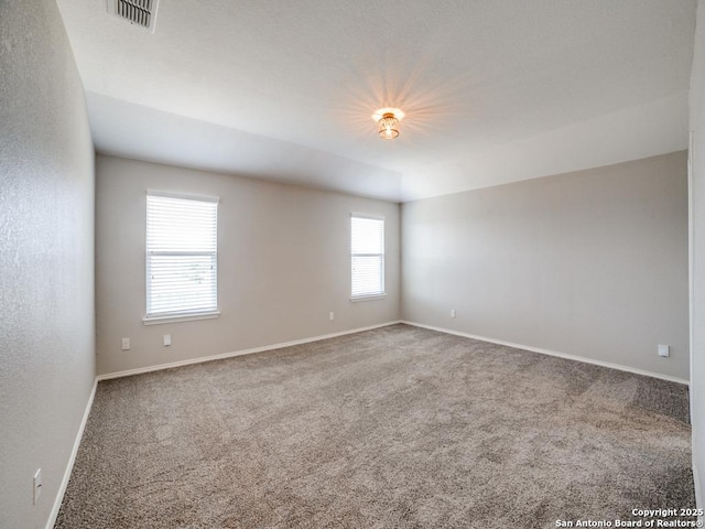 7010 Aphrodite Mist, San Antonio, TX 78252 - spare room featuring carpet flooring and baseboards