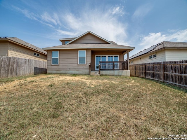 7010 Aphrodite Mist, San Antonio, TX 78252 - rear view of house with a shingled roof and covered porch