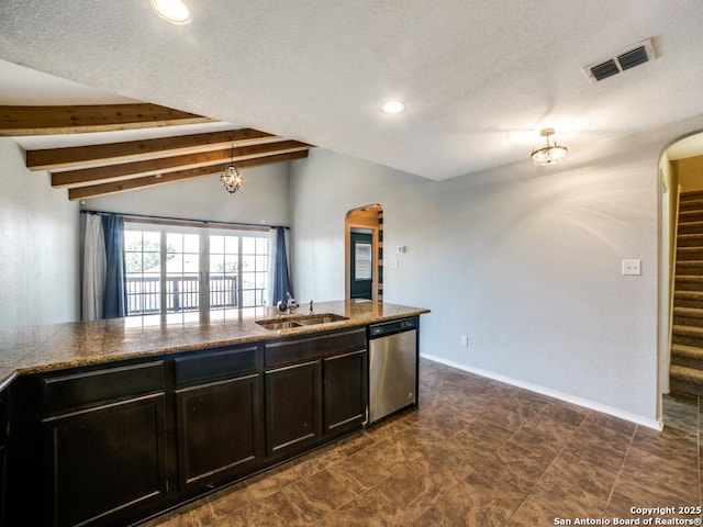 7010 Aphrodite Mist, San Antonio, TX 78252 - kitchen featuring stainless steel dishwasher, a sink, arched walkways, recessed lighting, and a textured ceiling