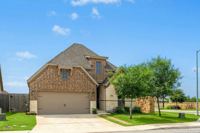 9304 Aggie Run, San Antonio, TX 78254 - view of front of house featuring roof with shingles, stone siding, an attached garage, concrete driveway, and brick siding