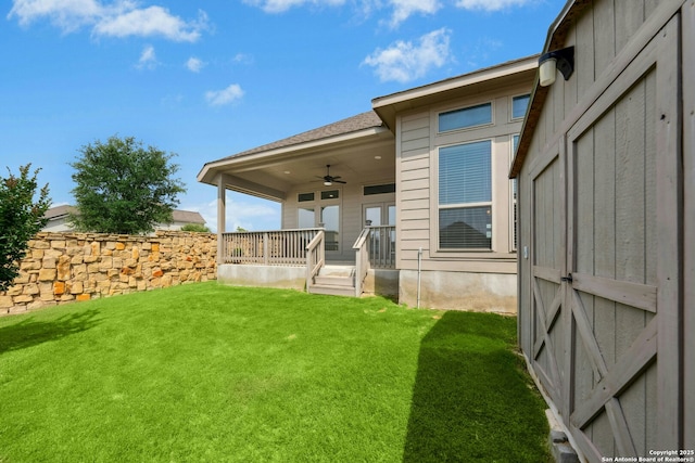 9304 Aggie Run, San Antonio, TX 78254 - view of green lawn featuring a ceiling fan and covered porch