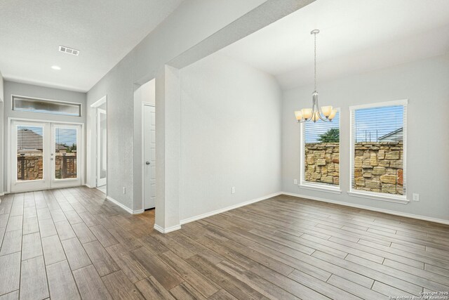 9304 Aggie Run, San Antonio, TX 78254 - unfurnished room featuring a chandelier, dark wood-style flooring, baseboards, french doors, and recessed lighting