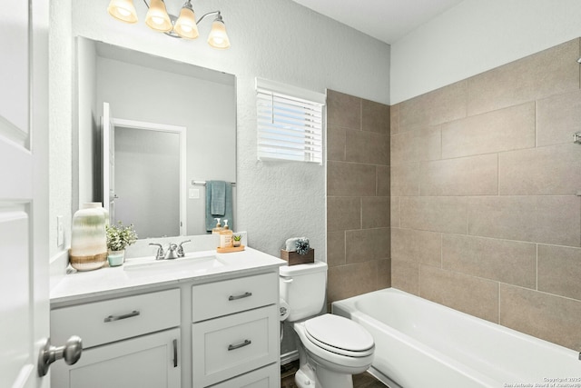 9304 Aggie Run, San Antonio, TX 78254 - full bathroom with toilet, vanity, a textured wall, a chandelier, and washtub / shower combination
