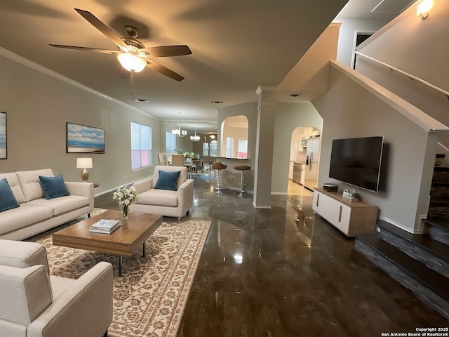 2606 Montebello, San Antonio, TX 78259 - living area featuring arched walkways, ornamental molding, baseboards, a ceiling fan, and stairs