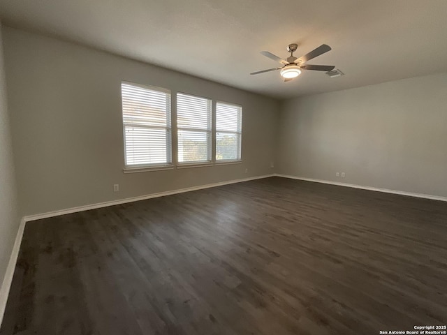 2606 Montebello, San Antonio, TX 78259 - empty room with dark wood finished floors, baseboards, and ceiling fan