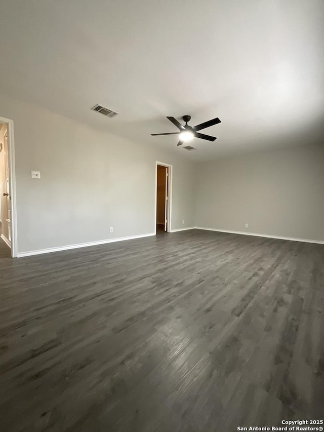 2606 Montebello, San Antonio, TX 78259 - spare room with baseboards, a ceiling fan, and dark wood-style flooring