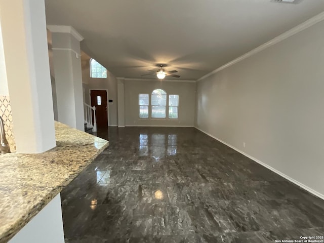 2606 Montebello, San Antonio, TX 78259 - unfurnished living room featuring ceiling fan, ornamental molding, and baseboards